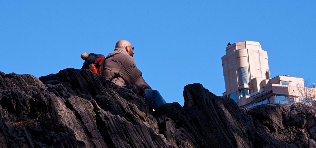 Man on Rock in Central Park